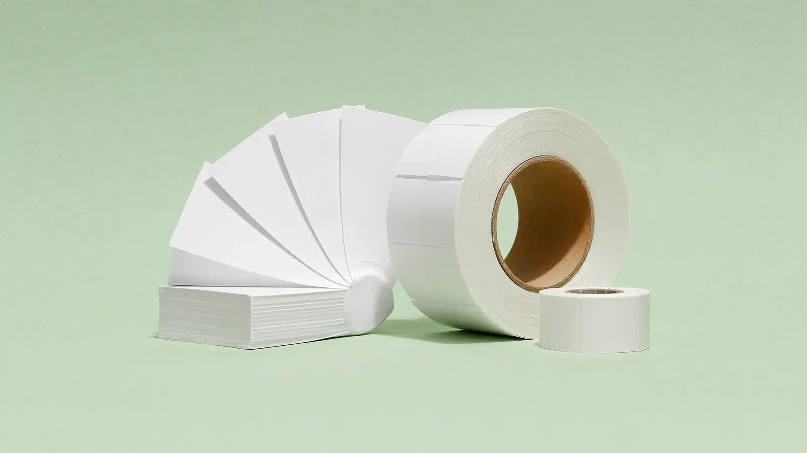 The kit for Best thermal labels: 4 × 6 rolls and fanfold stacks, laid out on a plain background