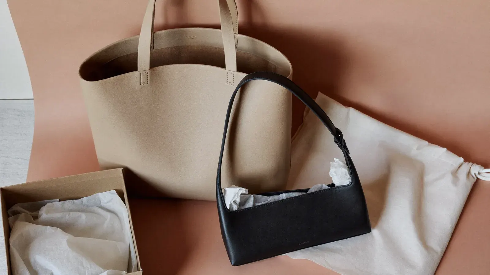 The kit for Pre-owned designer handbag room for Poshmark and eBay, laid out on a plain background
