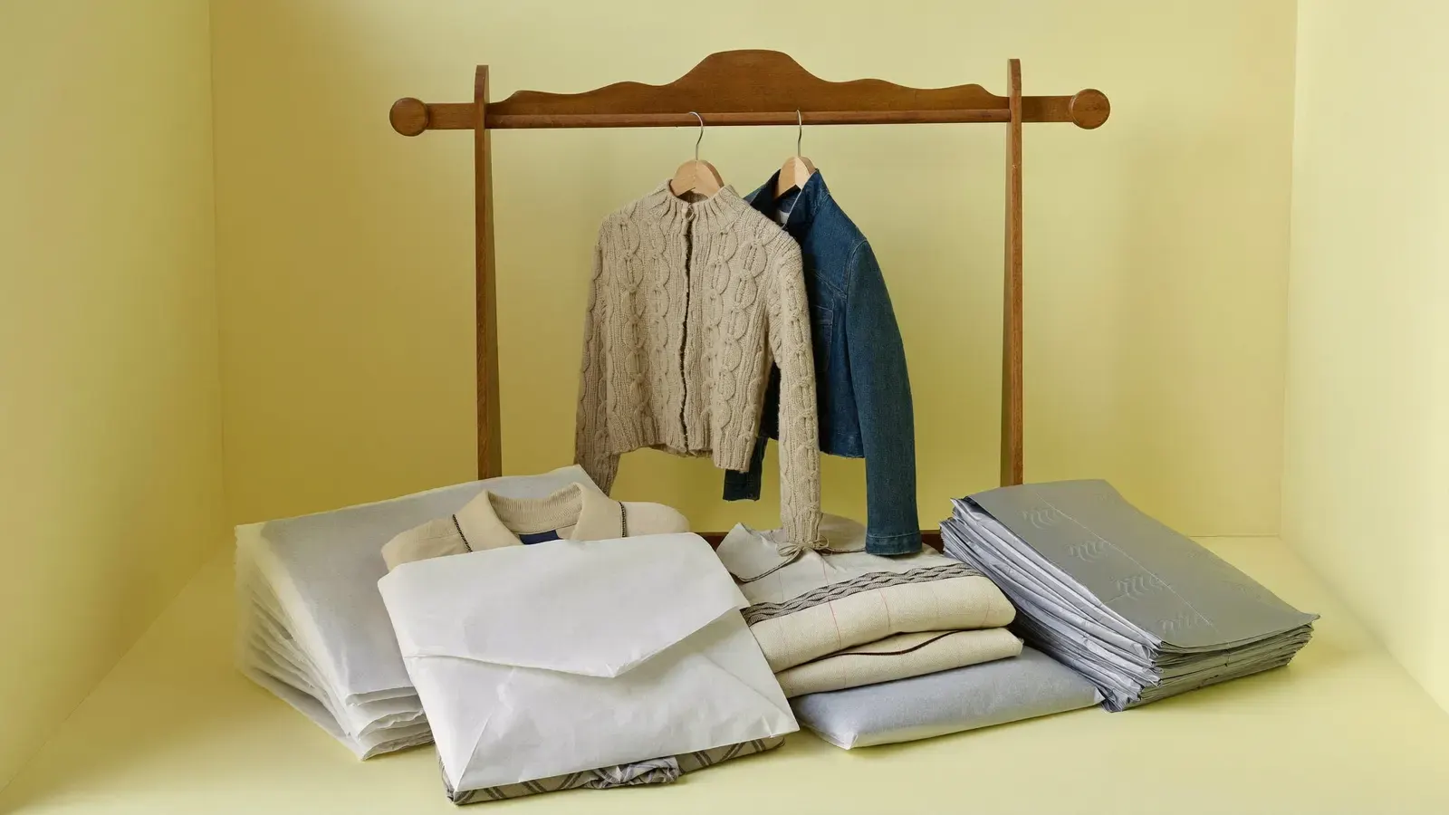 Spare-bedroom setup for a Vinted clothing seller: the kit, photographed as a studio still life